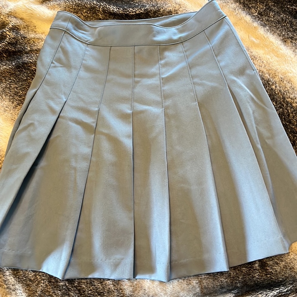 Divided mini skirt. Size 0. Never washed or worn. Dusty blue.